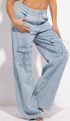 Light Denim with front tie pocket Stretchy. Model in Size Small 26 Waist 5'1 Measurements Small 28 Waist Medium 30 Waist Large 32 Waist Rise 12 Inseam 32 Jean Damas, January Outfits, Latest Winter Fashion, Jeans Art, After School Routine, School Routine, Mom Denim, Pant Trends, Late Winter