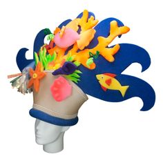 This Coral Reef Hat will definitely make you stand out at your next Party, Hora Loca, Wedding, Corporate Event, Birthday, Quinceanera, or Halloween Party! It can be used as a wedding hats, top hats, photo booth props, or a party favor. Whimsical Tall Crown Costume Hat For Party, Fun Party Costume Hat With Curved Brim, Novelty Hats For Carnival Themed Events, Whimsical Party Costume Hats And Headpieces, Novelty Hats For Carnival Costume, Fun Costume Hats With Curved Brim For Parties, Themed Mini Hat Cap For Costume Party, Whimsical Party Costume Cap, Novelty Costume Hats For Carnival