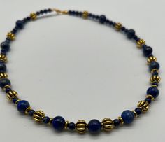 Neck chain in the Roman/Persian/Egyptian style of antiquity. In ancient times, the chains were worn close to the neck, as can be seen in numerous frescoes and mummy portraits. The necklace is made of lapis lazuli and gold-colored metal. Egyptian Necklace, Egyptian Style, Necklace Antique, Neck Chain, Ancient Times, Lapis Lazuli, Pendant Necklaces, Favorite Jewelry, Persian