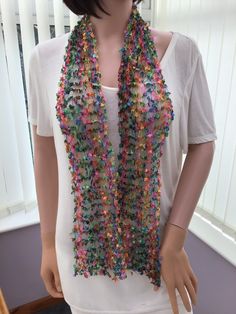 "This long, multicolour, skinny scarf, really is a very versatile wear, it could be worn as a headband, or a band for a sun hat, whilst adding style to any outfit. It would be a light gift to ship, & would suit any age group, great summer wear, & could be worn to the beach too. Its summer colours would look good on even the dullest of days. Polyester  Hand wash, dry flat Code- SCA 313 Approx size - 10cm (4\") across, 135cn (53\"\") long I have been established for several years , & have won awards for my scarves, as they are so versatile & easy to wear. I have also been interviewed on local radio" Multicolor Silk Scarf For Spring Party, Multicolor Silk Scarf For Party In Spring, Multicolor Scarves For Summer Parties, Bohemian Scarves For Summer Parties, Multicolor Summer Scarves For Party, Bohemian Party Scarves For Spring, One Size Summer Festival Scarves, Multicolor Bohemian Scarves For Party, Handmade Summer Beach Scarves