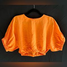 Orange Linen T-Shirt 100% Linen Never Been Worn, Brand New Orange Short Sleeve Crop Top, Orange Short Sleeve Casual Crop Top, Casual Orange Short Sleeve Crop Top, Solid Short Sleeve Tops For Vacation, Orange Crew Neck Top For Spring, Orange Short Sleeve Tops For Spring, Orange Crew Neck Top For Summer, Orange Relaxed Fit Tops, Orange Short Sleeve Casual Blouse