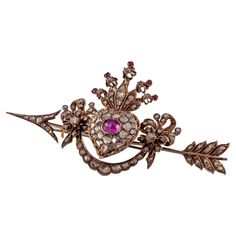 10k Gold Custom Antique Heart Arrow Brooch w/ Diamonds and Rubies Gorgeous Antique Brooch Features Garland with Bow Detailing on Arrow with Crowned Heart Ruby Cabochon Centerpiece with Old Cut Diamonds Length of Brooch = 47 mm Width of Brooch = 90 mm Total Mass = 24.3 grams Based on Design and Materials, dated to Georgian or Victorian era or earlier Gorgeous Antique Piece! Vintage Jewelry Antique, Georgian Jewelry, Heart Brooch, Heart With Arrow, Victorian Era, 10k Gold