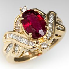 This impressive ring is centered with one (1) oval mixed cut natural rubellite tourmaline set into a four-prong setting. The ring is also accented with two (2), prong set, round brilliant cut diamonds and fifty-six (56), channel set, baguette cut diamonds. The ring measures 16.1mm at the top, rises 8.3mm above the finger, tapering to 3.3mm wide and 1.2mm thick at the base of the shank. This ring is currently a size 6.25. Tourmaline Rings, Antique Cocktail Ring, Golden Rings, Rubellite Tourmaline, Golden Ring, Baguette Cut Diamond, Tourmaline Ring, Pretty Rings, Unique Gemstones