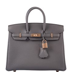 Birkin bags are known for being challenging to get, always ‘sold out’ in stores, being offered even a simple leather Birkin is never . This rare tin grey Etain Togo leather Birkin 25cm is a forever staple in your collection. Super Rare Introduced in the 2011 Autumn Winter collection, “Etain” refers to "tin" in French. This matte grey is effortless day or night. Shop all Baby Birkin's Color: EtainCondition: Store FreshHardware: Rose GoldMaterial: Togo LeatherCollection: 2022, U25cm: 10" W x 5" D x 8"HPictured accessories available separately Birkin Bags, Autumn Winter Collection, Simple Leather, Gold Ounce, St Helena, Rose Gold Hardware