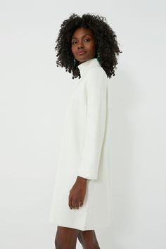 Meet the newest addition to your cold weather wardrobe- the Winter White Vivianne Dress. This mod-inspired silhouette wears well from school drop-offs to meeting friends for drinks with its cozy fabric, turtleneck detail, and a mini but not-too-short length. Pair with sneakers and a light jacket for a playful daytime look and switch to boots and statement jewelry for a chic but cozy night out. Turtleneck Three-quarter length sleeves Mini length Slight shimmer in fabric Material: 42% Rayon, 40% P Meeting Friends, Cozy Fabric, Plus And Minus, Meet Friends, Cocktail Attire, Cozy Night, Winter White, Light Jacket, Winter Dresses