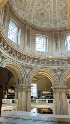 the inside of a library with many books on shelves