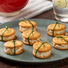 small crackers are arranged on a blue plate