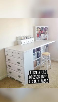 a white desk with several drawers and stools