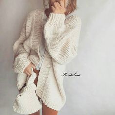 "Milk knitted cardigan. Oversized cardigan. Slouchy cardigan. Seamless cardigan. Wool-85% Alpaca-15% Color - Milk. Available in other colors. One size. Length approx 84-89 cm / 33\"-35\" Width: 62-64 cm / 24\"-25\" *The cardigan can be made without pockets and with pockets. To do this, in the \"Pockets\" option, select the one you need. Thanks. *See more pictures of cardigan with pockets here, link https://www.etsy.com/listing/1149512926/chunky-wool-cardigan-bulky-pocketed ❤ BUY A CARDIGAN AND G Long Cable Knit Cardigan, Hand Knit Cardigan, Cream Knit Cardigan, Loose Knit Cardigan, Slouchy Cardigan, Alpaca Cardigan, Oversized Sweater Cardigan, Cardigan Oversized, Oversized Knit Cardigan