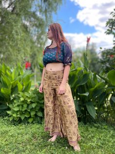 Our beautiful handmade  boho chic palazzo trousers  are made of high quality soft Indian silk. These trousers  are perfect for any type of occasion. After a day on the beach, for an evening dinner or even a cocktail party. You can find the matching top in our shop. Best choice to impress, you'll look divinely beautiful in this bohemian  trousers. A must have for every bohemian queen. The elastic waist expands from 30 inches (76,2 cm)  and the length is approx 40 inches (approx 101 cm). The material is 70% silk and 30% viscose. The photos are an estimate of the actual colours and patterns. Sometimes these colours are difficult to identify and describe -- we are presenting them depending on the lighting and the quality of your computer monitor. The actual products are most often far more viv Bohemian Boho Print Pants For Vacation, Non-stretch Boho Print Bottoms For Summer, Summer Wide Leg Maxi Skirt In Rayon, Summer Festival Wide-leg Harem Pants, Summer Wide Leg Rayon Maxi Skirt, Boho Print Harem Bottoms For Summer, Summer Boho Print Harem Bottoms, Boho Print Hippie Pants For Vacation, Wide Leg Boho Print Pants For Vacation