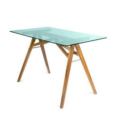 a glass table with wooden legs on a white background