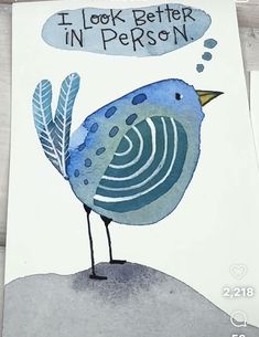 a card with a blue bird on it and the words i look better in person