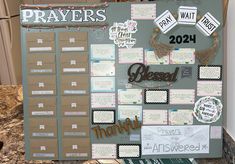 a bulletin board that has been decorated with paper and stickers for prayer time on it