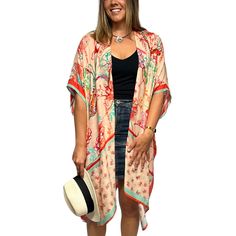 There's no such thing as owning too many kimonos. Add to your collection with these super soft essentials featuring an extra lengthy fit. Perfect for endless occasions: beach cover up, vacation layer, brunch, parties, daily wear, dress up shorts, after yoga, and more! Endless patterns to choose from make it difficult to just pick one. But your wardrobe will thank you for adding more to your collection. Size: One size fit most 38" wide by 37" long Material: 100% Viscose Machine wash. Tumble dry l Lightweight Open Front Casual Cover-up, One Size Long Cover-up For Day Out, Vacation Beach Cover-up Kimono With Kimono Sleeves, Casual Boho Print Festival Cover-up, Boho Print Cover-up With Kimono Sleeves For Beach Season, Long Spring Loungewear Cover-up, Printed Beach Cover-up With Kimono Sleeves, Printed Kimono Beach Cover-up For Beach Season, Pink Kimono For Beach Cover-up During Beach Season