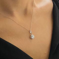 - Solitaire Round Necklace is made with high-quality 925K Sterling Silver. - Dainty, delicate, elegant, charm, cute and trendy round solitaire pendant necklace is a good example for summer jewelry. - 925K sterling silver solitaire round pendant comes with a free 925K Sterling Silver chain and decorated with a round and cubic zirconia stones. - The stone size is 6MM X 6MM, the total size including halo is 9MM X 9MM - You receive CZ halo solitaire necklace in a beautiful and free gift box - Free s Fine Jewelry Necklaces For Gifts, Sparkling, Fine Jewelry Sparkling Necklaces For Gifts, Dainty Sparkling Diamond White Jewelry, Fine Jewelry Sparkling Necklace For Gift, Dainty Sparkling White Gold Jewelry, Delicate Cubic Zirconia Jewelry With Halo Setting, Delicate Sparkling Jewelry As A Gift, Delicate Sparkling Jewelry Gift, Delicate Sparkling Jewelry For Gifts