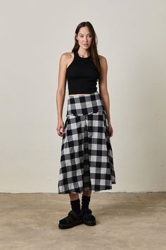 Classic meets modern with this high-waisted semi-flare skirt in a bold cotton yarn dye buffalo plaid. The side zip and raw stitch detailing add a touch of edge to this timeless pattern, making it the perfect blend of chic and statement-worthy. Fabric & Care: 100% Cotton Woven Machine Wash Cold Made in Los Angeles, CA Jumpsuit Fall, Fall Lookbook, Fall Denim, Summer Lookbook, Skirt Jumpsuit, Plaid Skirt, Fall Shopping, Plaid Skirts, White Summer