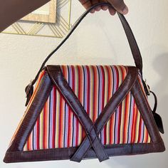 I Made This Handmade Bag By Myself Using A Blend Of African Fabric And Real Leather From West Africa. I Have About 3 Samples And I Am Attempting To Sell Them Here. Leather Is Authentic! Fabric Is Timeless. It Has An Adjustable Strap If You Want To Carry It As A Crossbody Bag. It Is A Statement Piece. You’ll Absolutely Love It! Measurement 14” X 12” Black Tote Purse, Tooled Leather Handbags, Buckle Bags, Quilted Purses, Boho Purses, Leather Floral, Woven Belt, Juicy Couture Bags, Patchwork Bags