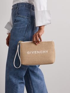 Givenchy's pouch can be used to keep toiletries secure while traveling, or as a clutch when heading to local markets on vacation. It's made from raffia embroidered with the brand's moniker and has a detachable leather wristlet strap. There's plenty of space inside for your phone, cardholder and cosmetics. Porter Bag, Australia Clothes, Summer Style Guide, Flat Dress Shoes, Raffia Bag, Givenchy Women, Travel Toiletries, Toiletry Bag Travel, White Embroidery