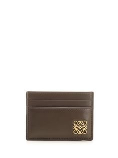 "Anagram" card holder in navy blue leather from Loewe with 5 slots and silver Anagram inlaid plaque. Gold Wallets With Card Slots For Business, Luxury Classic Card Holder With Smooth Grain, Designer Brown Card Holder For Formal Use, Designer Brown Card Holder For Formal Occasions, Elegant Brown Card Holder With Coin Pocket, Designer Gold Card Holder For Everyday Use, Luxury Formal Card Holder With Card Slots, Elegant Gold Card Holder With Rfid Blocking, Elegant Brown Card Holder For Formal Occasions