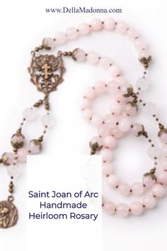 If you're looking for a stunning Catholic women's gift, take a closer look at the St. Joan of Arc rosary at Della Madonna. This lovely heirloom rosary is handmade in rose quartz and clear quartz beads with cast bronze medals depicting Saint Joan of Arc as well as the Cross of Lorraine associated with her. #joanofarc #vintagecatholic #catholicrosary #frenchvintage Beautiful Rosaries, Cross Of Lorraine, Saint Feast Days, St Joan Of Arc, Saint Joan Of Arc, St Joan, Flower Carving