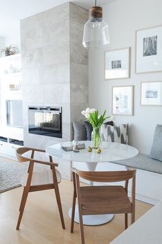 a living room filled with furniture and a fire place