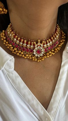 Discover the epitome of elegance with our premium choker necklace set. Crafted with precision and designed to turn heads, this set is a true masterpiece. Product Details: Material: Each piece is meticulously handcrafted from high-quality brass, Copper, Silver, Kundan, 22 Karat Gold Plating, Soft Fabric lining inside. Choker Necklace Dimensions: Weight: 100 grams. Closure Type: Premium Dori Adjustable Size: Yes  Earring Dimensions (Per Pair): Weight: 32 grams Length: 6.5 cm Width: 5 cm Closure Ty Elegant Festive Choker With Intricate Design, Elegant Kundan Jewelry For Ceremonial Occasions, Elegant Ceremonial Kundan Jewelry, Festive Bridal Necklace For Anniversary, Fusion Style Bridal Necklace With Round Tilla, Elegant Festive Choker, Elegant Kundan Choker Necklace For Ceremonial Occasion, Elegant Hand Set Choker For Ceremonial Use, Elegant Hand Set Choker For Ceremonial Occasions