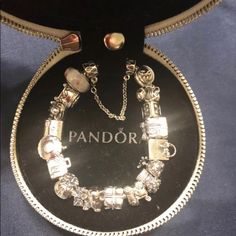 Bracelet 7.1 Include 19 Charms Box Cupcake, Girl,M, Gift Box,Pandora Bag,Giraffe,Love,Baby Carrier,Gift,Elephant,Dollar Bag,Luggage,Coffee Mug,Love Envelope,Buddha, Jewelry Box,Pink Mirando Charm, 1 Clo, 1 Spacer I Took It To Pandora Store Appraisal For $875 Luxury Silver Jewelry In Gift Box, Elegant White Bracelet For Birthday Gift, Luxury Charm Bracelet - Perfect Gift, Luxury Charm Bracelet For Gift, Luxury Charm Bracelet As Gift, Luxury White Gold Charm Bracelet Gift, Elegant Silver Charm Bracelet For Gifting, Luxury Silver Jewelry For Birthday Gift, Silver Jewelry In Original Box For Anniversary