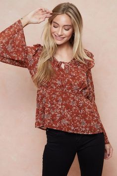 The Feeling Sweet Top By Doe & Rae will have you feeling oh so sweet! This Peplum style blouse features a beautiful floral print, long bell sleeves and V Neckline with tie detail. Fabric: 100% Polyester Measurements:Bust: Size M- 20'' Length: Size M- 25'' True To Size S 0-6 M 6-10 L 10-14 Long Sleeve Peasant Top With Floral Print For Spring, Long Sleeve Floral Print Peasant Top For Spring, Fall Brunch Bell Sleeve Blouse, Spring Floral Print Bell Sleeve Blouse, Feminine Tops With Ditsy Floral Print For Fall, Feminine Ditsy Floral Print Tops For Fall, Bohemian Ditsy Floral Print Tops For Fall, Fall Floral Print Blouse For Brunch, Feminine Bell Sleeve Blouse For Fall