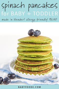 a stack of pancakes with blueberries on top and the words spinach pancakes for baby toddler made in blender allergy friendly blw