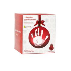 a christmas ornament with a hand print on it