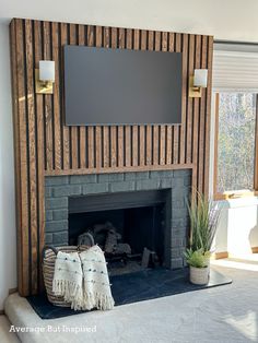 a fireplace with a flat screen tv mounted on it's wall above the mantle