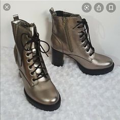 Brand New With Tags. No Trades! Accepting Reasonable Offers! Metallic Ankle Boots For Fall, Metallic Silver Leather Boots With Round Toe, Chic Metallic Boots With Round Toe, Silver Boots With Reinforced Heel For Winter, Silver Winter Boots With Reinforced Heel, Winter Silver Boots With Reinforced Heel, Casual Silver Boots For Fall, Metallic Leather Boots With Round Toe, Trendy Metallic Winter Boots