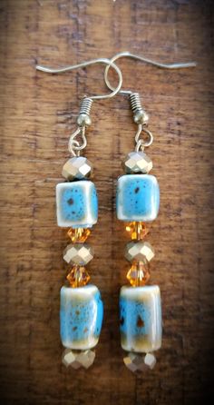 Blue and Beige ceramic rectangular earings with gold and silver accent beads Rectangular Jewelry With Dangling Beads For Gifts, Gift Jewelry With Dangling Rectangular Beads, Beige Ceramic, Napa Ca, Silver Accents, Gold And Silver, Jewelry Earrings Dangle, Dangle Drop Earrings, Dangle Earrings