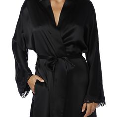 This Bijoux robe feels silky smooth to the touch. A long flowing, luxurious piece to have in your wardrobe. Cut with a dolman sleeve for an easy fit with delicate French lace at the cuff. Made in Canada. Style# BIJR8050 Style: Long Silk Robe w/ Waist Tie Fabric: 100% Silk. Made in Canada. Design: Side seam pockets, french lace at the cuffs with a dolman sleeve. Fit and Tips: Fits generously, all bust sizes. An amazing gift. Elegant Night Robe With V-neck, Elegant V-neck Kimono For Daywear, Elegant V-neck Robe In Solid Color, Feminine Long Sleeve Night Robe, Elegant Long Sleeve Evening Sleepwear, Elegant Long Sleeve Sleepwear, Elegant Sleepwear With Kimono Sleeves For Loungewear, Elegant Solid Color Long Sleeve Robe, Elegant Night Robe For Spring