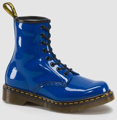 A unique interaction of the classic Dr Martens 1460 boot. Its instantly recognizable DNA looks like this: 8 eyes, classic Dr. Martens Smooth leather, grooved sides, a heel-loop, yellow stitching, and a comfortable, air-cushioned sole. Built on the iconic Dr. Martens air-cushioned sole, which is oil and fat resistant with good abrasion and slip resistance Use Dr. Martens' Wonder Balsam to keep your boots clean, protect the leather, and keep it soft and supple Dr. Martens run true to US size with Blue Doc Martens, Dr Martens Store, Dr Martens Womens, Back To School Shoes, Kawaii Shoes, Patent Leather Boots, Dr Martens Boots, Patent Shoes, Boots Uk