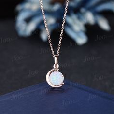 The moon engagement pendant necklace are a popular choice, represents I LOVE YOU TO THE MOON AND BACK , used to express the vastness of one's affection for another. HOW TO STYLE : it is the most versatile and elegant statement necklace for casual days in the office and nights out. It's your go-to statement piece whatever the occasion. It also can be personalized to show your uniqueness in the party, date, banquet. PERFECT FOR GIFTING: This alexandrite necklace is classic and never go out of style,  packaged in delicated gift box , It's a good choice of an anniversary, engagement, birthday, Mother's Day gifts, Christmas day, Thanksgiving Day, Valentine's Day gift for a couple, friend, family. AFTER-SALE SERVICE : 30 days money-back guarantee and for any reason, you are not satisfied with yo White Moon Phase Necklace For Wedding, Fine Jewelry With Moon Charm For Wedding, Wedding Necklaces With Moon Phase Round Pendant, Moon Phase Round Pendant Necklace For Wedding, Moon Shaped Birthstone Necklace For Anniversary, Moon-shaped Birthstone Necklace For Anniversary, Dainty Moon-shaped Wedding Necklace, Crescent Moon Phase Necklace For Wedding, White Moon-shaped Wedding Necklace