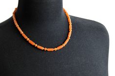 A simply stoned orange necklace... perfect for those who love the color orange and all things that remind you of fall. The natural Orange Aventurine gemstone beads have an alternating pattern of disk and tube with warm brass-tone accents, clasp, and 3 inch chain for adjustable length. Perfect everyday wear! Length: Adjustable from 16.5-19 inches Beads: Natural Orange Aventurine rondelle and tube beads Clasp and accents : antique bronze/brass ABOUT ORANGE AVENTURINE: This gem can vary in color fr Luxury Spiritual Orange Necklace, Stone Choker Necklace, Car Crystals, The Color Orange, Orange Aventurine, Car Charms Mirror, Orange Necklace, Aventurine Stone, Stone Choker