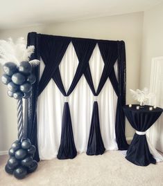 black and white party decorations with balloons