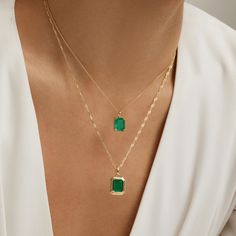 Charm your way through life with the Endless Emerald Necklace, a sublime selection from our Envy collection. With a link chain made from top-tier 925 sterling silver and plated with shimmering 14K gold, this enviable design exudes endless possibilities. The baguette cut emerald fusion stone is set in a matching 14K gold bordered base for a smooth style and glamorous addition to your ensembles. Metal: 925 Silver Plating: 14K Gold E-coated Length: 16"+ 2" Extension Stone: Emerald Fusion Stone Dainty Luxury Emerald Necklace As Birthstone, Luxury Hand-strung Rondelle Emerald Necklace, Emerald Necklace Silver, Emerald Necklace Indian, Emerald Chain, Stone Ring Design, Jewel Necklace, Casual Jewelry, Emerald Necklace