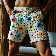 - Artisanal crochet shorts for men, adorned with multicolored flower motifs for a distinctive boho vibe - Tailored to evoke a breezy, beach-ready look, perfect for festivals and summer outings - Available in custom color combinations to complement your unique fashion sense - Constructed with precision to ensure a 95% resemblance to the image shown, satisfaction guaranteed SIZES and MEASUREMENTS - The pictured item is suitable for sizes M. If you are unsure, please choose your regular size and give us your measurements! We'll make sure that the item is customized for you. PERSONALIZATION - Note that everything at Smyrna Collective is handmade individually by our creators. So we can do any Size / Design / Color customization that you like! Extra charge difference is applied for orders over L Crochet Shorts For Men, Thick Men Fashion, Crochet Mens Shorts, Mode Queer, Floral Beach Wear, Festival Mode, Crochet Men, Flower Motifs, Crochet Shorts