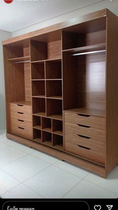 a large wooden cabinet with drawers and shelves