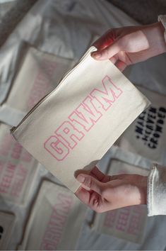 a person holding a bag with the word german on it