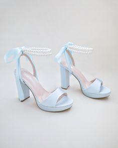 light blue satin platform wedding heels with double pearls ankle strapivory satin platform wedding heels sandals with double pearls ankle strap Hoco Heels, Baby Blue Heels, Blue Platform Heels, Shoes For Brides, Homecoming Shoes, Night Date, Prom Dress Shoes, Wedding Shoes Heels, Platform Block Heels