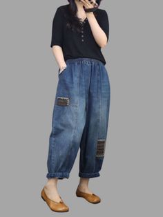 These Harem pants are made of high-quality denim material and come in a classic blue color. The pants have a natural waist and a unique loose-fitting style that flatters any body shape. Their relaxed fit makes them comfortable for all-day wear. while the nine-pant length gives them a trendy and modern look. The Harem style of these pants offers a combination of comfort and style. making them a versatile piece that can be dressed up or down for various occasions. The durable denim material ens... Baggy Indigo Jeans With Pockets, Baggy Medium Wash Cargo Pants, Casual Baggy Medium Wash Pants, Casual Baggy Dark Wash Pants, Casual Dark Wash Baggy Pants, Casual Dark Wash Tapered Leg Bottoms, Indigo Baggy Casual Jeans, Baggy Indigo Casual Jeans, Baggy Indigo Denim Jeans