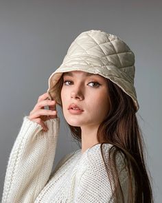 Winter quilted bucket hat will protect your head from the cold wind in Fall-Winter season. The hat is very light, soft and comfortable to wear. SIZE: One universal size fits most between 20.5 - 23 inches (52 - 58 cm) (XS - L)! SEND AS GIFT: If you need gift box, congratulatory message and express shipping, you can choose it all during checkout the order in the cart. (You can type the words in the postcard, which you want). EXPRESS SHIPPING: USA - FedEx shipping available within 2 days and Overni Warm Cloche Hat For Winter, Winter Solid Color Bucket Hat One Size, Warm Winter Cloche Hat, Winter Bucket Hat With Fleece Lining, Reversible Brimmed Bucket Hat For Winter, Winter Outdoor Bucket Hat, Trendy Winter Outdoor Bucket Hat, Casual Cream Cloche Hat For Winter, Beige Bucket Hat For Fall