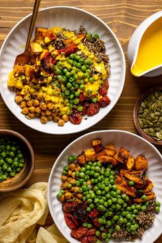 three bowls filled with different types of food on top of a wooden table next to other dishes