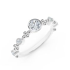 This ring features a uniquely inscribed Forevermark center diamond.  It can be stacked or layered with other rings from the Forevermark Tribute™ Collection to create a perfectly curated look, either for yourself or as a special gift for a loved one. Forevermark Diamonds, White Gold Rings, Special Gifts, Diamond Ring, White Gold, Engagement Rings, Gold, Gifts