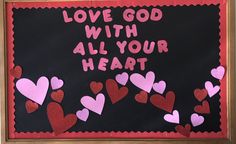 a bulletin board with hearts on it that says, love god with all your heart