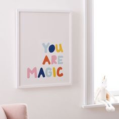 a white framed art print with the words you are magic on it