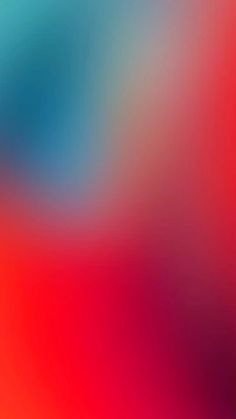 a blurry image of red and blue colors